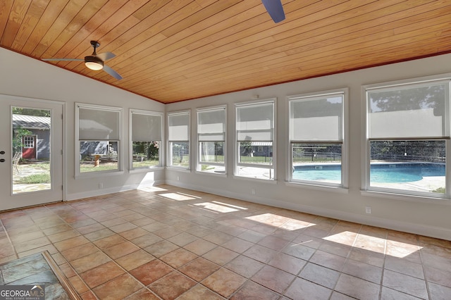 unfurnished sunroom featuring vaulted ceiling, wooden ceiling, and ceiling fan