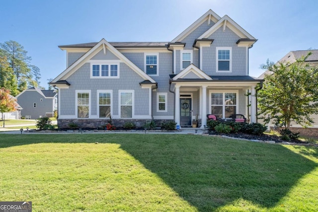 view of front of house with a front lawn