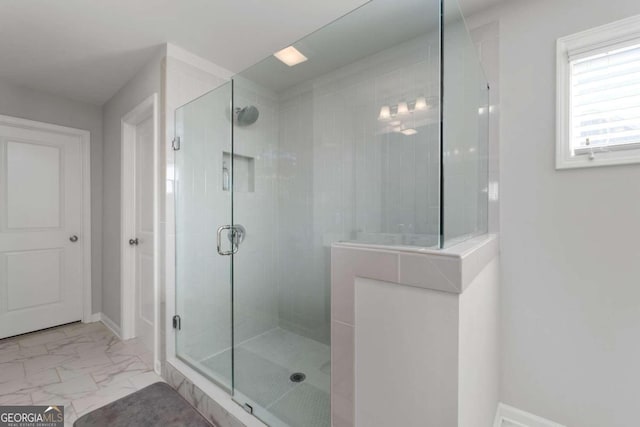 bathroom featuring walk in shower