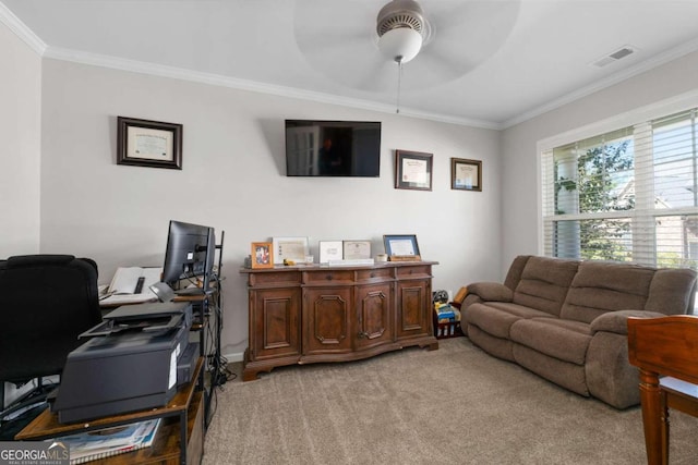 office space featuring ornamental molding, light colored carpet, and ceiling fan