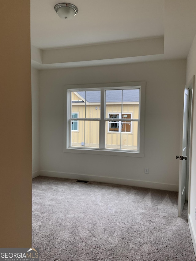 view of carpeted spare room