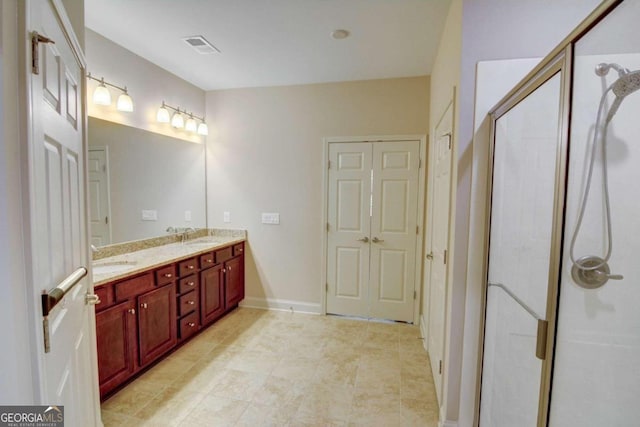 bathroom featuring vanity and walk in shower