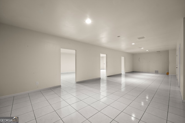 spare room with light tile patterned floors