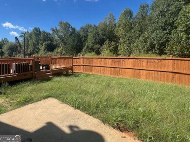 view of yard featuring a deck