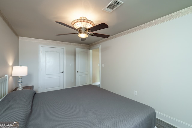 unfurnished bedroom featuring ceiling fan