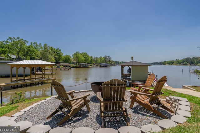 dock area with a water view