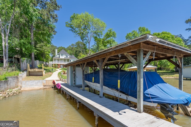 view of dock featuring a water view