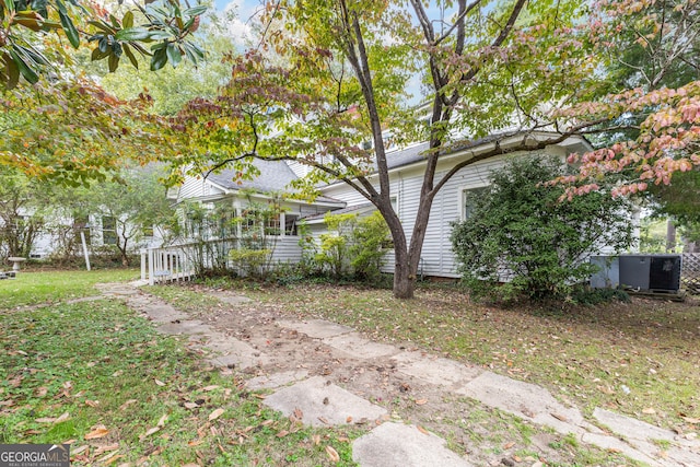 view of yard featuring a sunroom