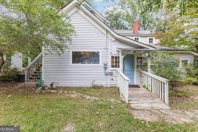 view of front of home with a front yard