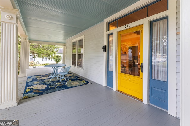 wooden deck featuring a porch