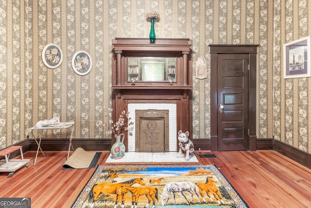 unfurnished room featuring wood-type flooring