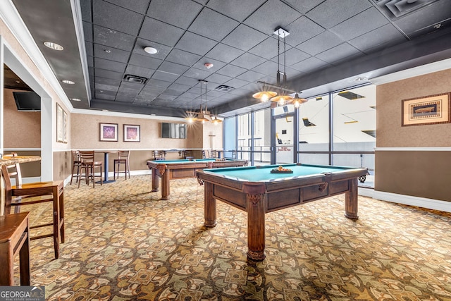 game room featuring a paneled ceiling, ornamental molding, carpet floors, and pool table