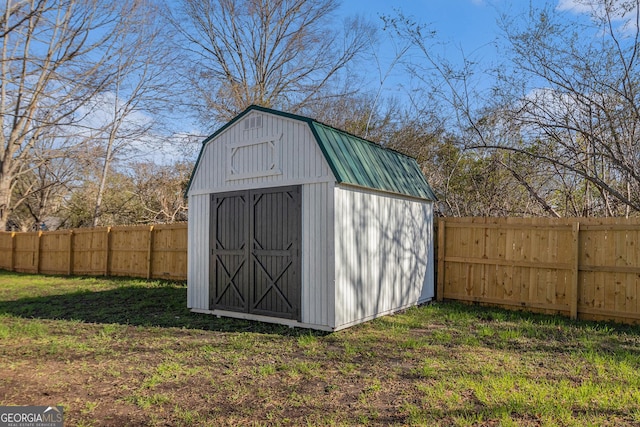 view of shed featuring a fenced backyard