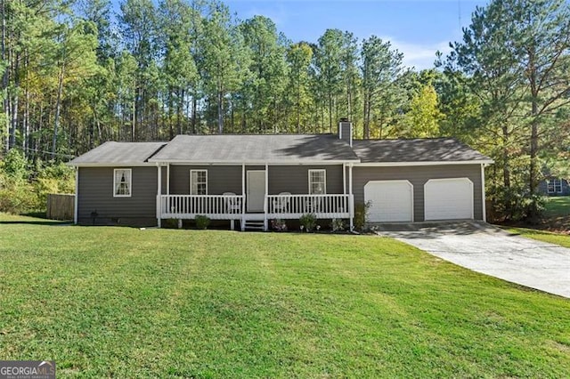 ranch-style house featuring a porch, a front lawn, and a garage