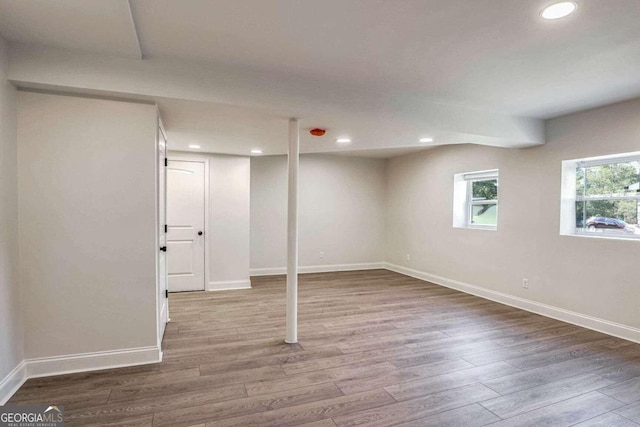 basement with wood-type flooring