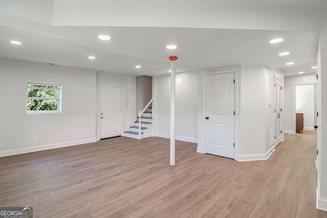 basement featuring light wood-type flooring