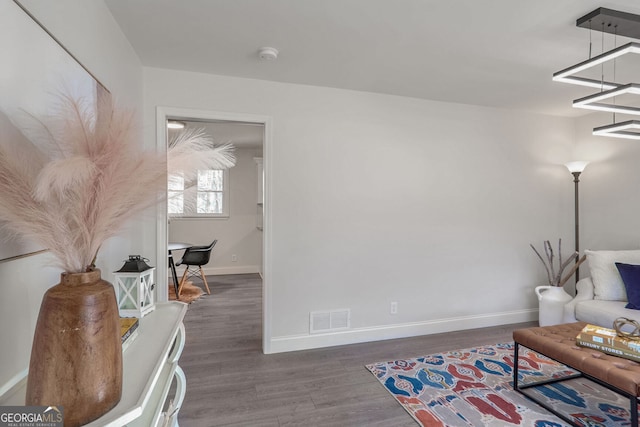 interior space with dark hardwood / wood-style flooring