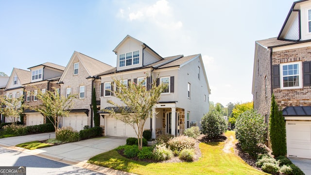 multi unit property featuring a garage