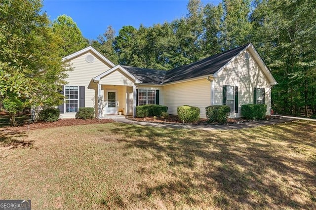 single story home with a front yard