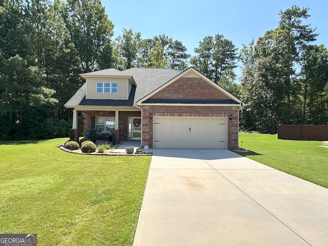 craftsman house with a front yard, covered porch, and a garage