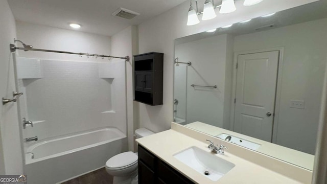 full bathroom featuring vanity, toilet, shower / washtub combination, and hardwood / wood-style floors