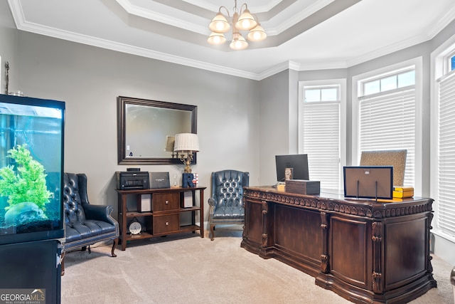 carpeted office space featuring crown molding, a chandelier, and a tray ceiling