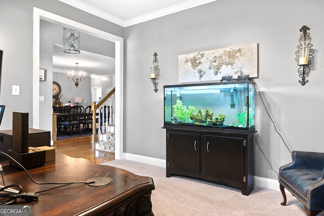 living room with ornamental molding, an inviting chandelier, and light colored carpet