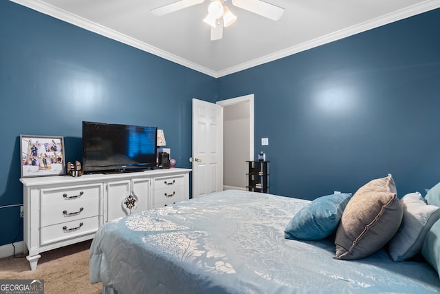 bedroom with ceiling fan, light carpet, and ornamental molding