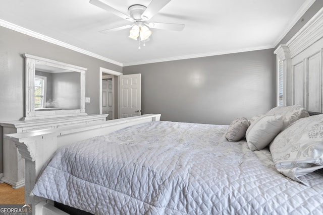 bedroom with ceiling fan, crown molding, and carpet flooring