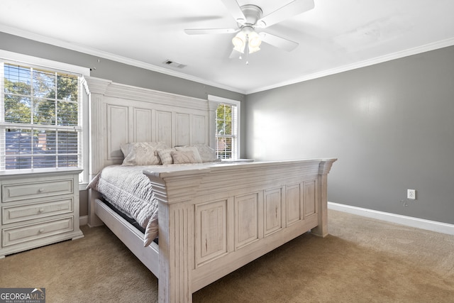 bedroom featuring carpet, multiple windows, and ceiling fan