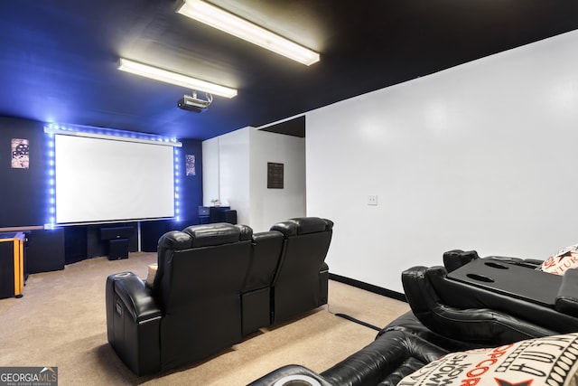 home theater room featuring light carpet