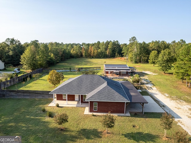 bird's eye view featuring a rural view and a view of trees