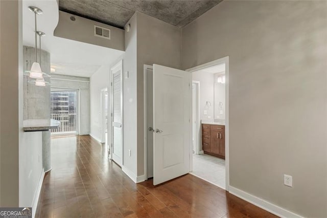 hall featuring wood-type flooring