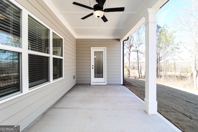 view of patio featuring a ceiling fan