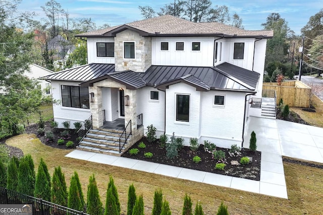 modern farmhouse with a front yard