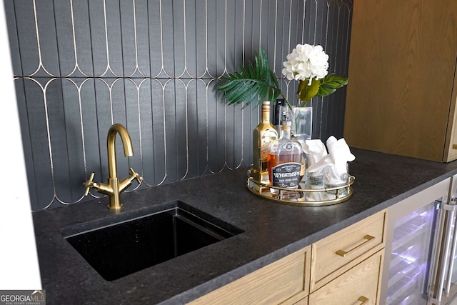 room details featuring wood walls, indoor wet bar, and wine cooler