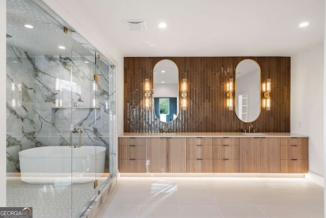 bathroom with tile patterned flooring, vanity, plus walk in shower, and wood walls