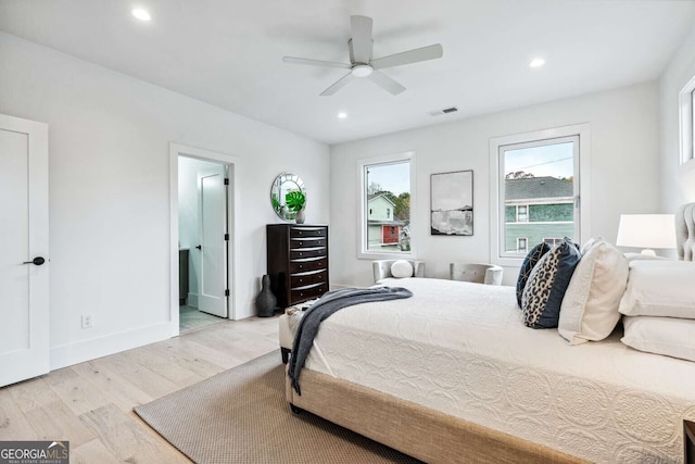 bedroom featuring ceiling fan and light hardwood / wood-style floors