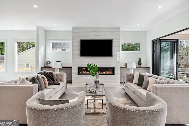 living room featuring a fireplace