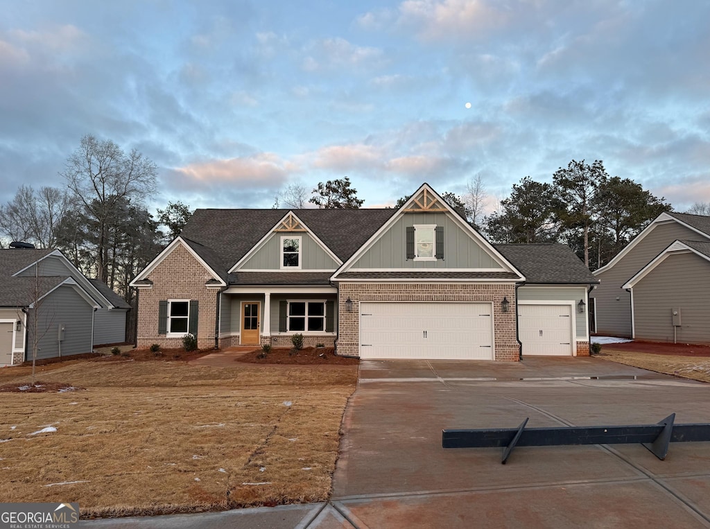 craftsman-style home featuring a garage