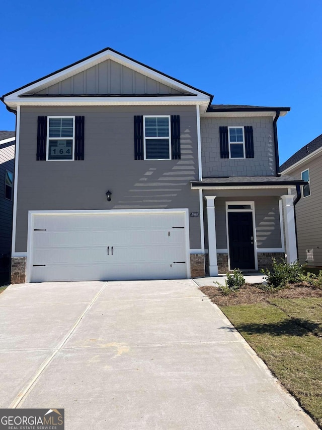 view of front of property with a garage