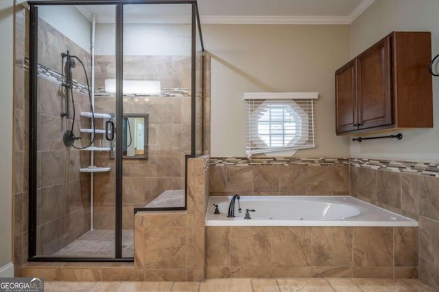 bathroom featuring independent shower and bath, ornamental molding, and tile patterned floors