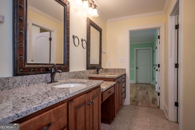 bathroom with vanity and crown molding