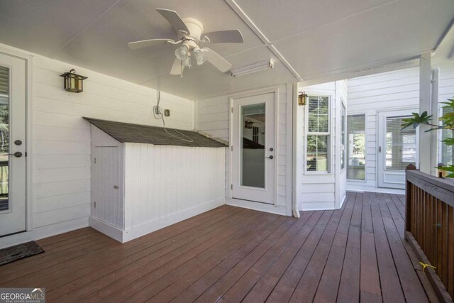 wooden terrace with ceiling fan