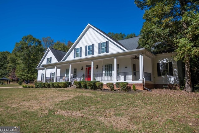 farmhouse-style home featuring a front yard and a porch