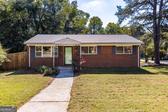 view of front facade with a front yard