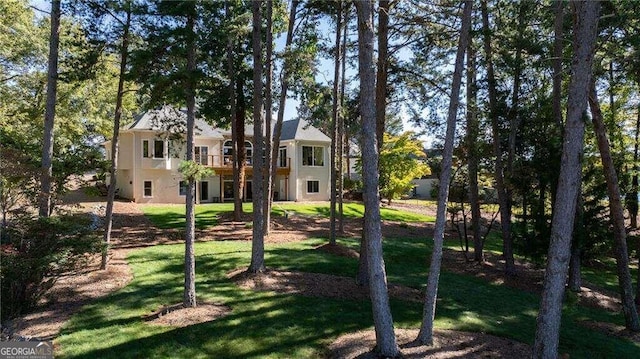 view of yard with a wooden deck