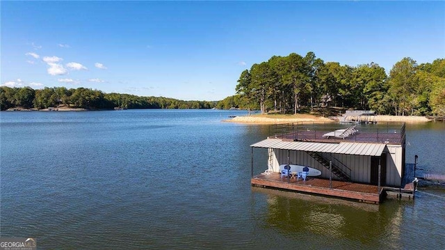 view of dock with a water view