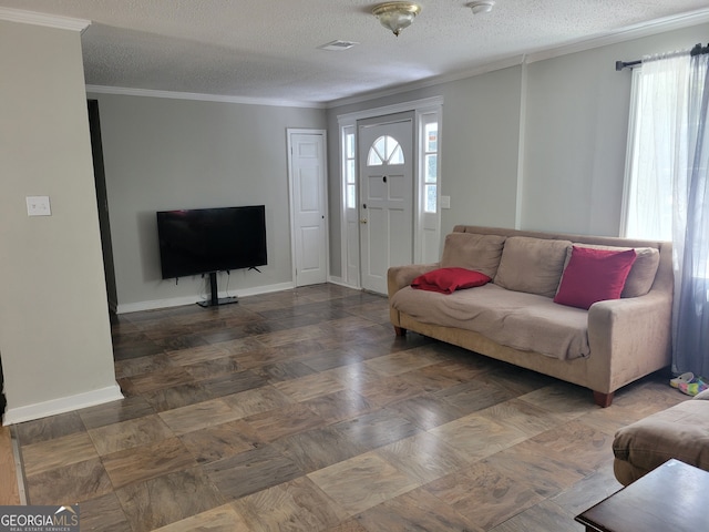 living room featuring dark wood-type flooring, crown molding, and a textured ceiling