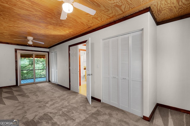 unfurnished bedroom with wood ceiling, crown molding, light colored carpet, and ceiling fan